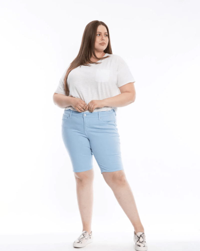 Front of a model wearing a size 14 Haley Mid rise Bermuda in CERULEAN by Slink Jeans. | dia_product_style_image_id:256096